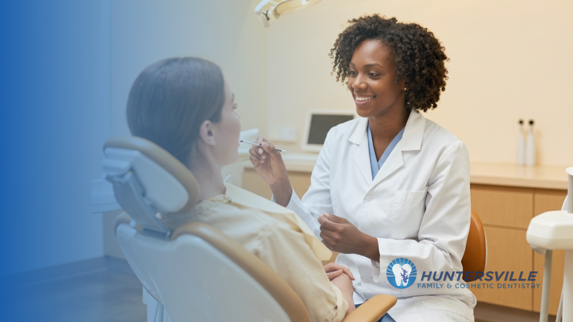 female dentist applying whitening paste to teeth